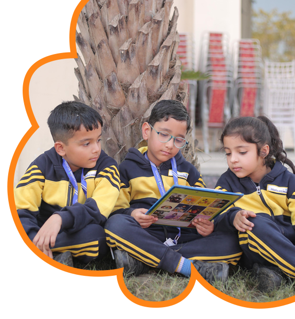 Children laughing while doing science experiment at Prarambha